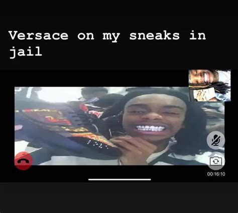 YNW Melly shows off Versace sneakers in new jail photo